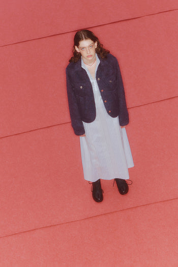 Blue striped high-neck dress by LOVE CRAZY WILD MAN featuring a stylish, fitted silhouette and long sleeves.