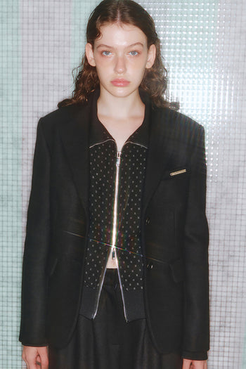 Black wool track jumper by LOVE CRAZY WILD MAN featuring a cozy, casual design with ribbed cuffs and neckline.