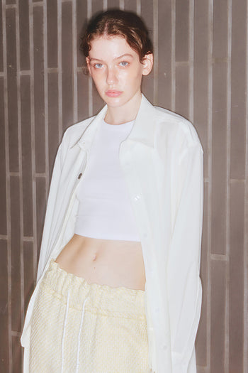 Ivory long shirt jumper from LOVE CRAZY WILD MAN featuring a relaxed fit and button-up front.