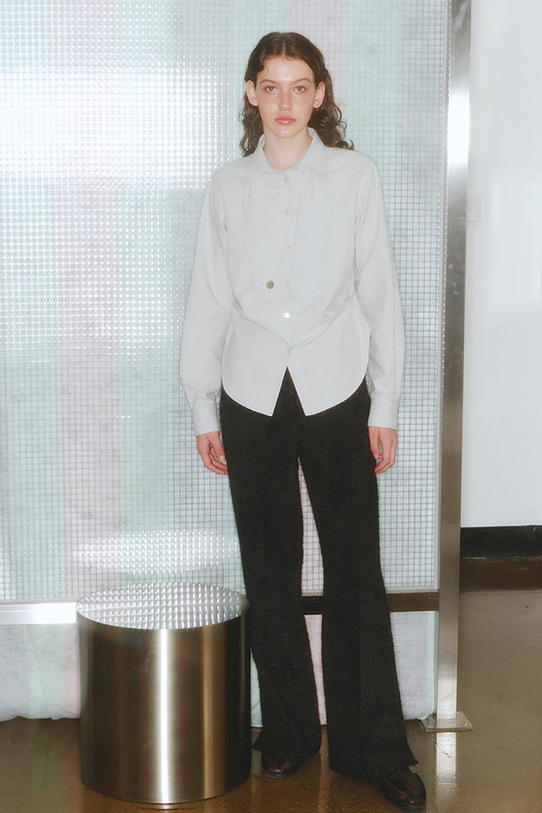 Black Bouncle Bell Bottoms by LOVE CRAZY WILD MAN, featuring wide-leg style and high-waisted design, shown on a model.