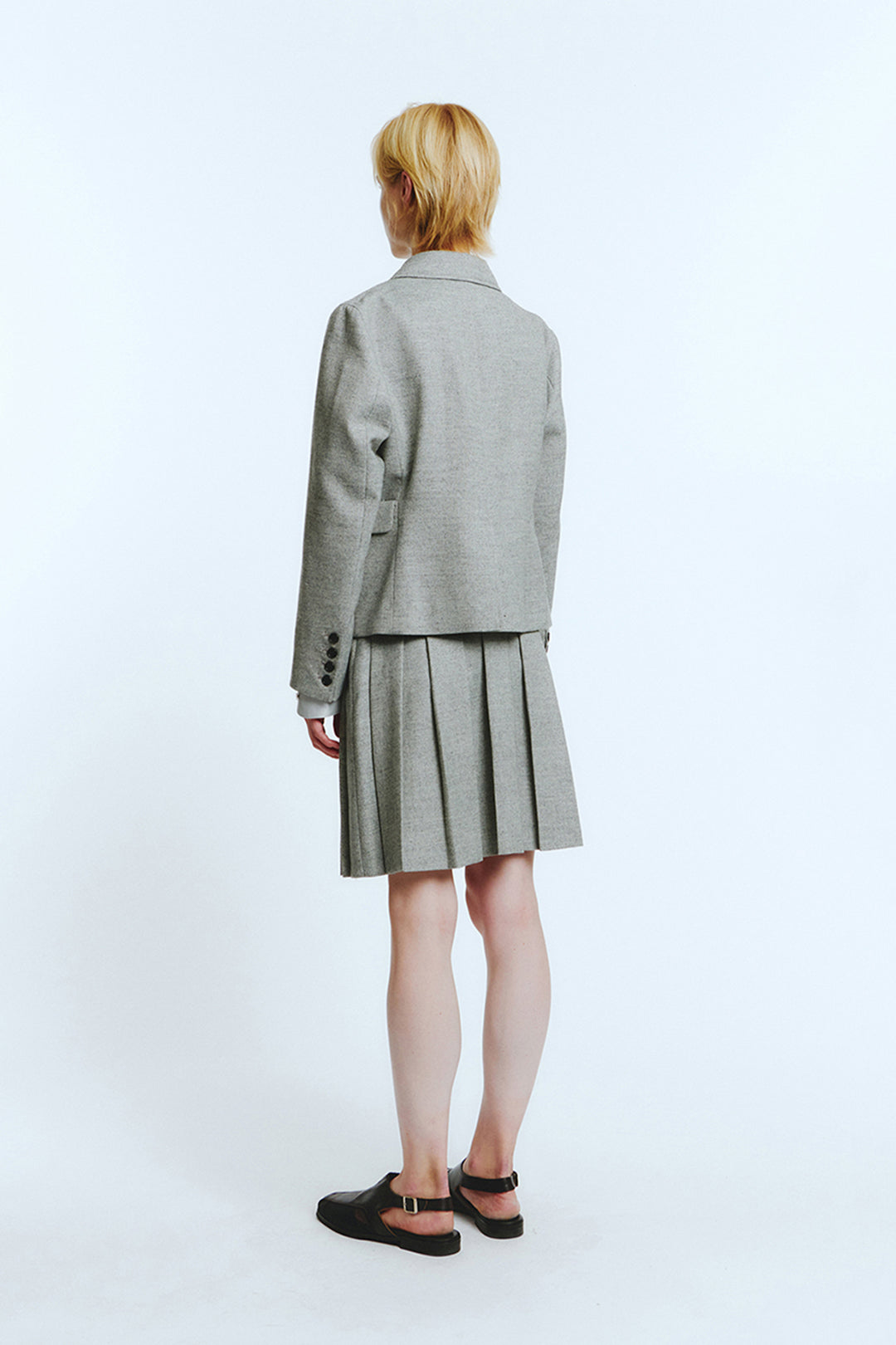 LOVE CRAZY WILD MAN Pocket Jacket in melange gray, showing a stylish, lightweight jacket with a zip front and pocket details.