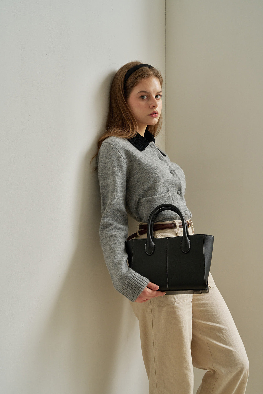 Medium Blenged leather bag by MIULIN featuring a spacious design and sleek brown finish, perfect for everyday use.