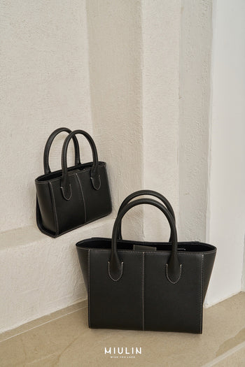 Medium Blenged leather tote bag by MIULIN with sturdy handles and sleek design, perfect for everyday use.