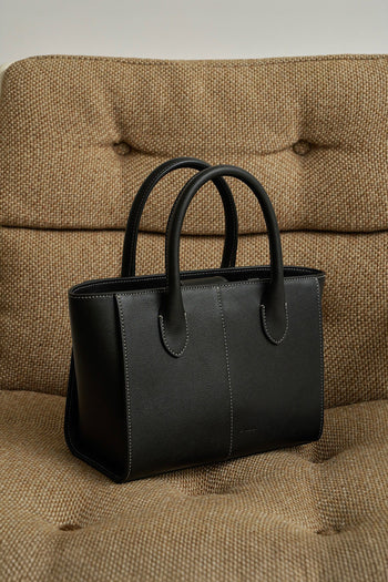 Medium MIULIN Blenged leather tote bag with sturdy handles and sleek design, shown in a natural beige color.