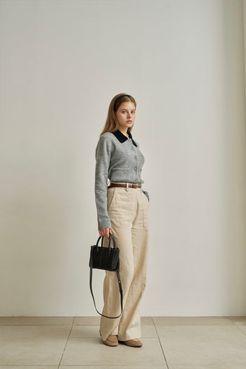Small MIULIN Blenged leather bag featuring a sleek design with top handles and a compact structure for everyday use.