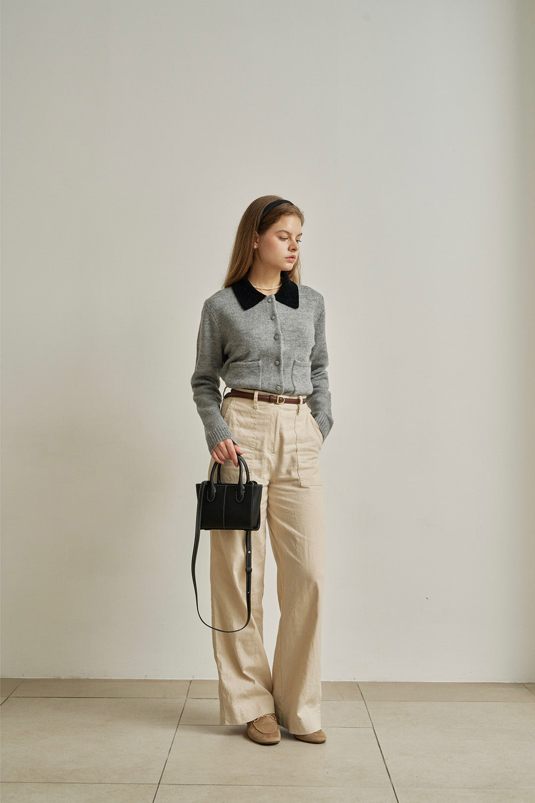 Small MIULIN Blenged leather bag with sturdy handles and sleek design, perfect for everyday use.