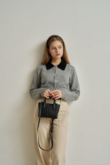 Small MIULIN Blenged leather bag with top handles and sleek design, ideal for everyday use.