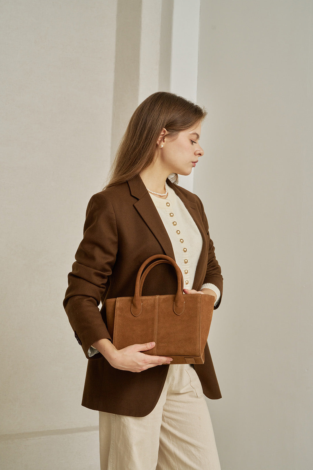 Medium Brunir suede tote bag by MIULIN, showing its soft textured suede material and spacious design.