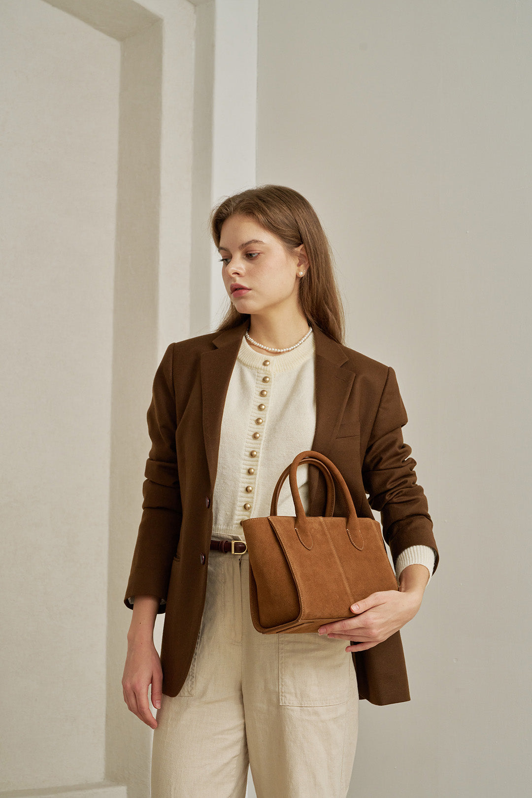 Medium Brunir suede bag by MIULIN featuring a spacious tote design with sturdy handles and a soft, textured suede finish.