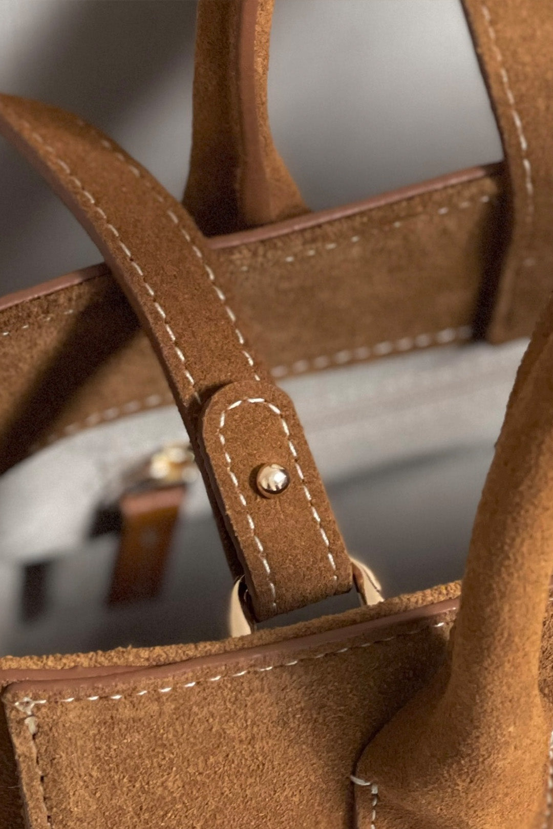 Medium Brunir suede bag by MIULIN with sturdy handles and a sleek design, perfect for casual or everyday use.