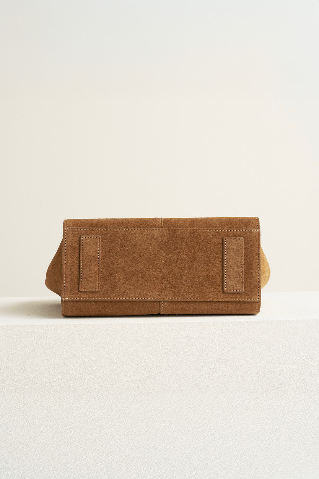 Medium Brunir suede tote bag by MIULIN with top handles and spacious interior, showcasing soft texture and stylish design.