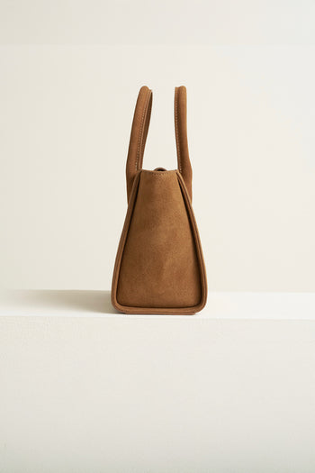 Medium Brunir suede tote bag by MIULIN with sturdy handles and smooth suede texture, perfect for everyday use.