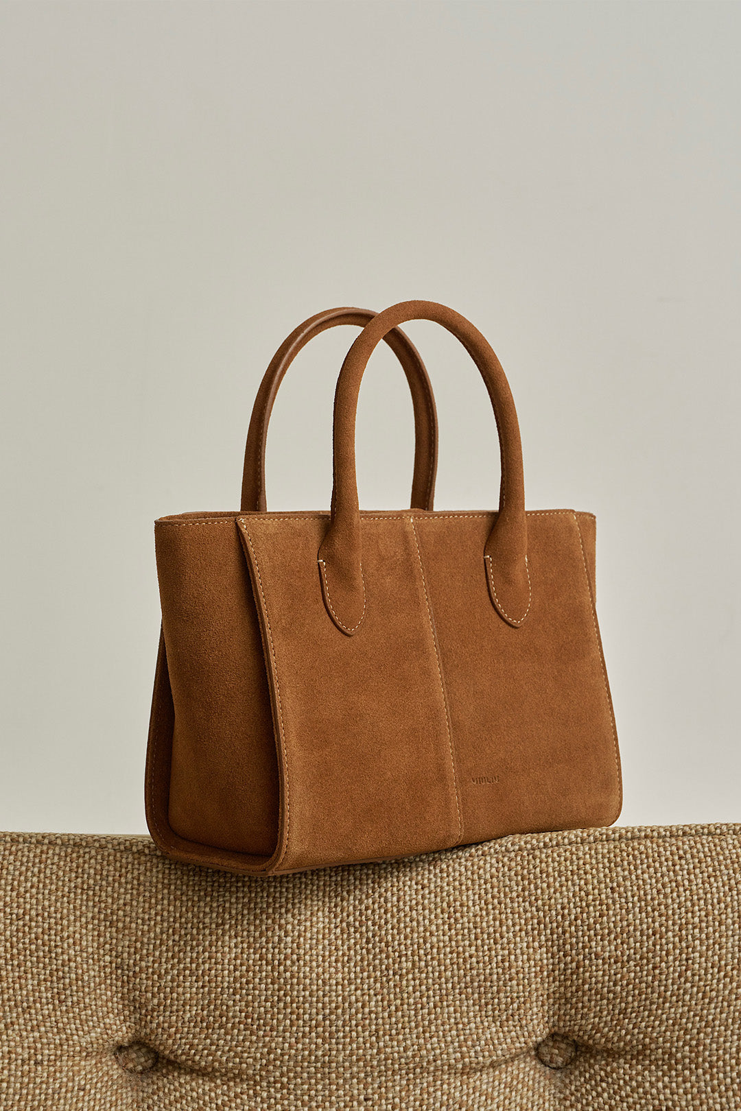 Medium Brunir suede bag by MIULIN featuring a spacious tote design with sturdy handles and a sleek, minimalist style.