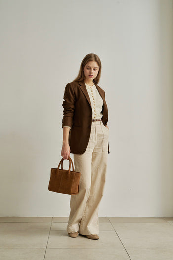 Medium Brunir suede bag by MIULIN featuring a structured tote design with top handles and soft suede texture.