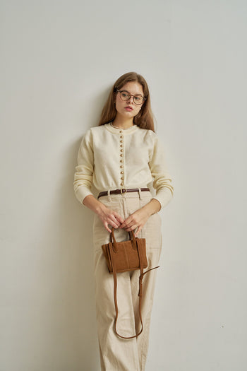 Small MIULIN Brunir suede bag with soft, textured surface and sleek design, perfect for casual or elegant occasions.