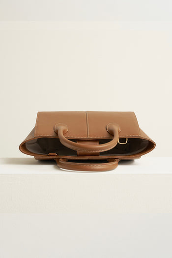 Medium Camille leather bag by MIULIN, featuring a sleek design with a top handle and spacious interior.
