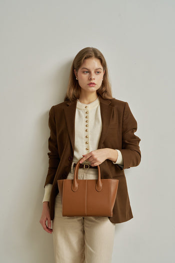 Medium Camille leather bag by MIULIN, featuring a sleek design with top handles and a spacious interior.