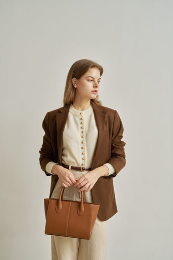 Medium Camille leather bag by MIULIN featuring a sleek design with top handles and a structured shape.