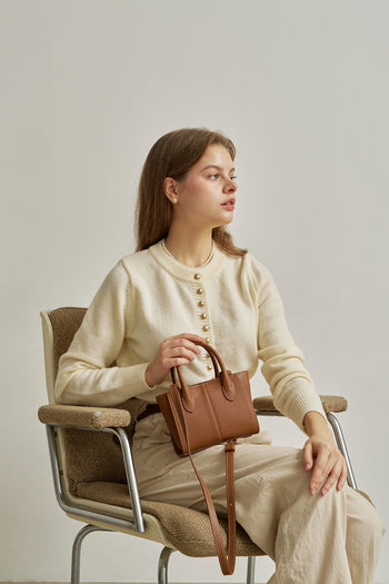 Small MIULIN Camille leather bag with top handles and sleek design, perfect for stylish everyday carry.