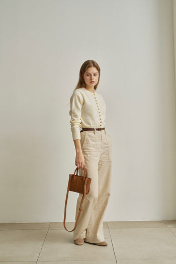 Small MIULIN Camille leather bag with a sleek design, featuring a compact shape and elegant leather finish.