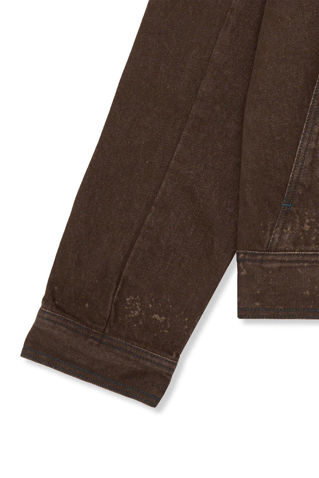 IOEDLE Crash Bloom laser-engraved jacket, close-up of detailed floral design on black fabric, stylish and unique outerwear.