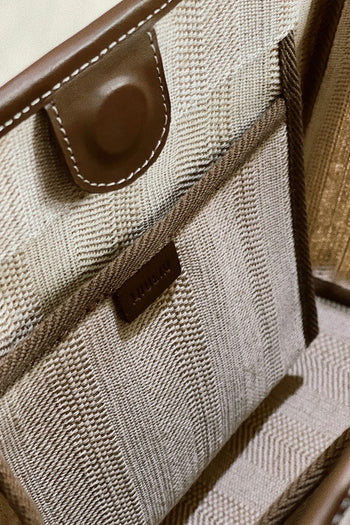 Large beige creamed canvas tote bag by MIULIN with sturdy handles and spacious interior for everyday use
