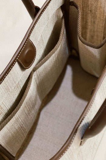 Large beige creamed canvas tote bag by MIULIN with sturdy handles and spacious interior for everyday use.