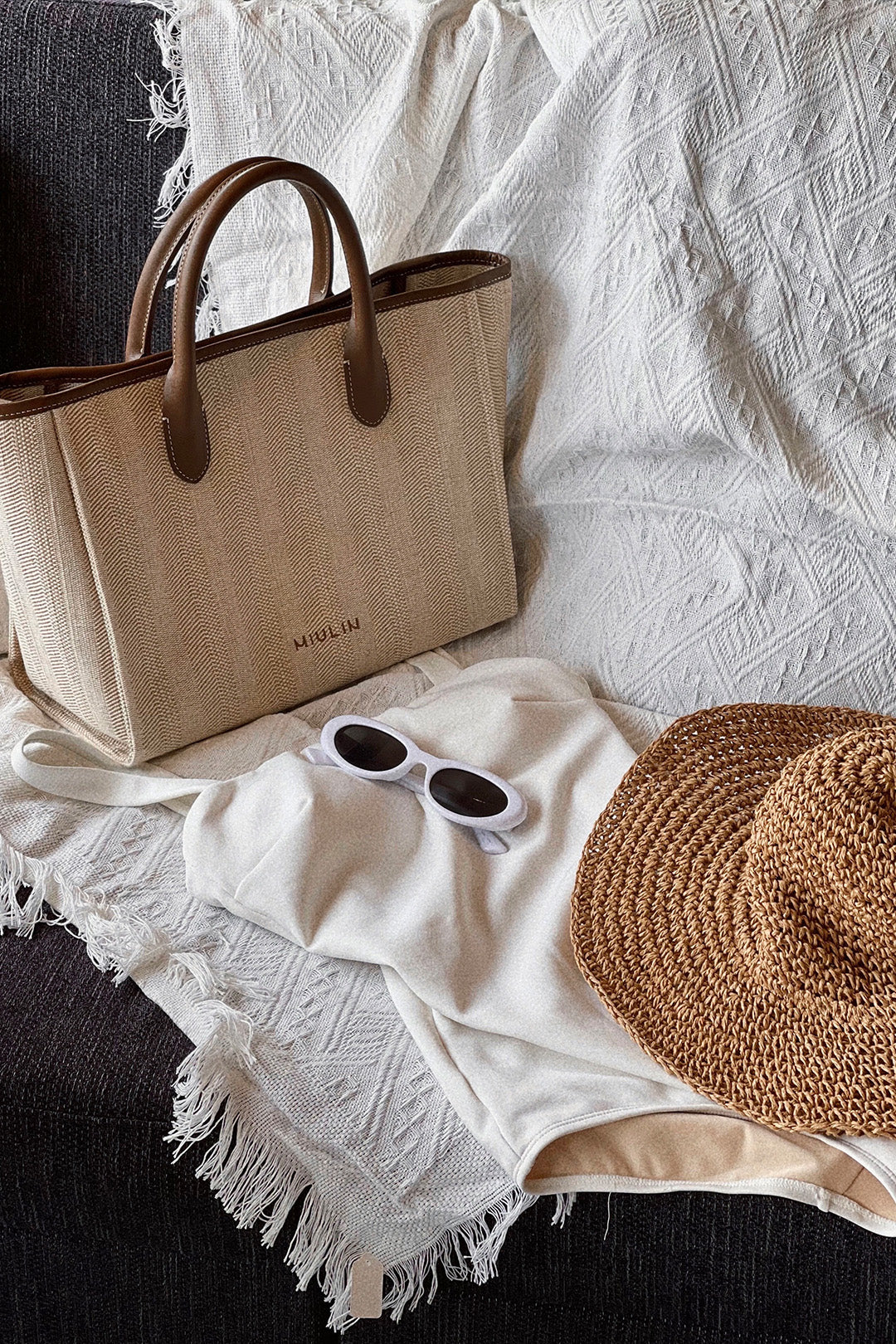 Large beige creamed canvas tote bag by MIULIN with sturdy handles and spacious interior for everyday use.