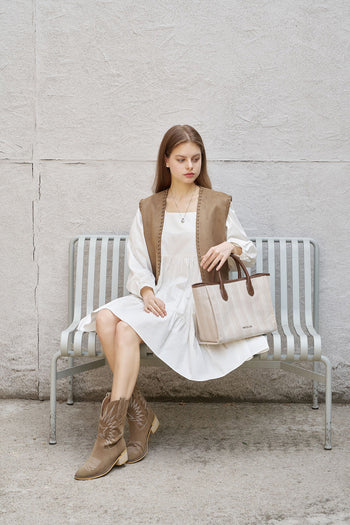 Large beige creamed canvas tote bag by MIULIN with sturdy handles and spacious interior for everyday use.