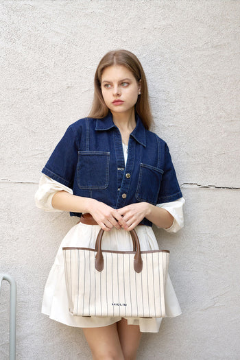 Large creamed canvas tote bag with stripe design by MIULIN, showing sturdy handles and spacious interior for everyday use.