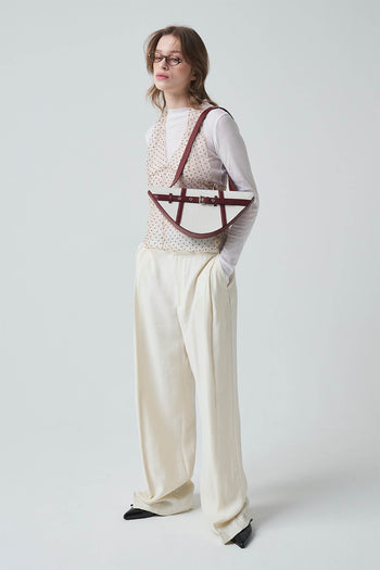 Deep red GOCHI bag by LE SAUT featuring a stylish design and sturdy handles, perfect for everyday use.