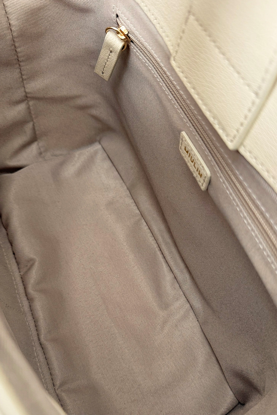 Medium Ivoire leather tote bag by MIULIN with sleek design and sturdy handles, perfect for everyday use.