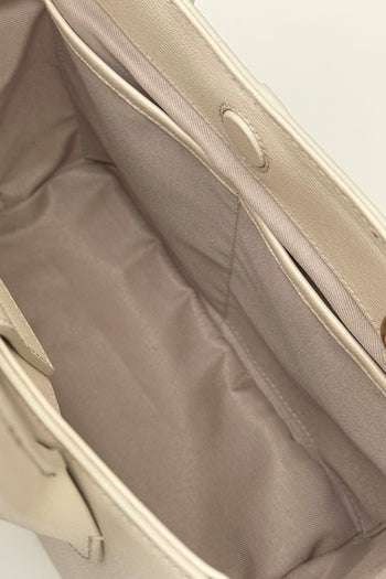 Medium Ivoire leather bag by MIULIN, showcasing its elegant design, smooth texture, and spacious interior for everyday use.
