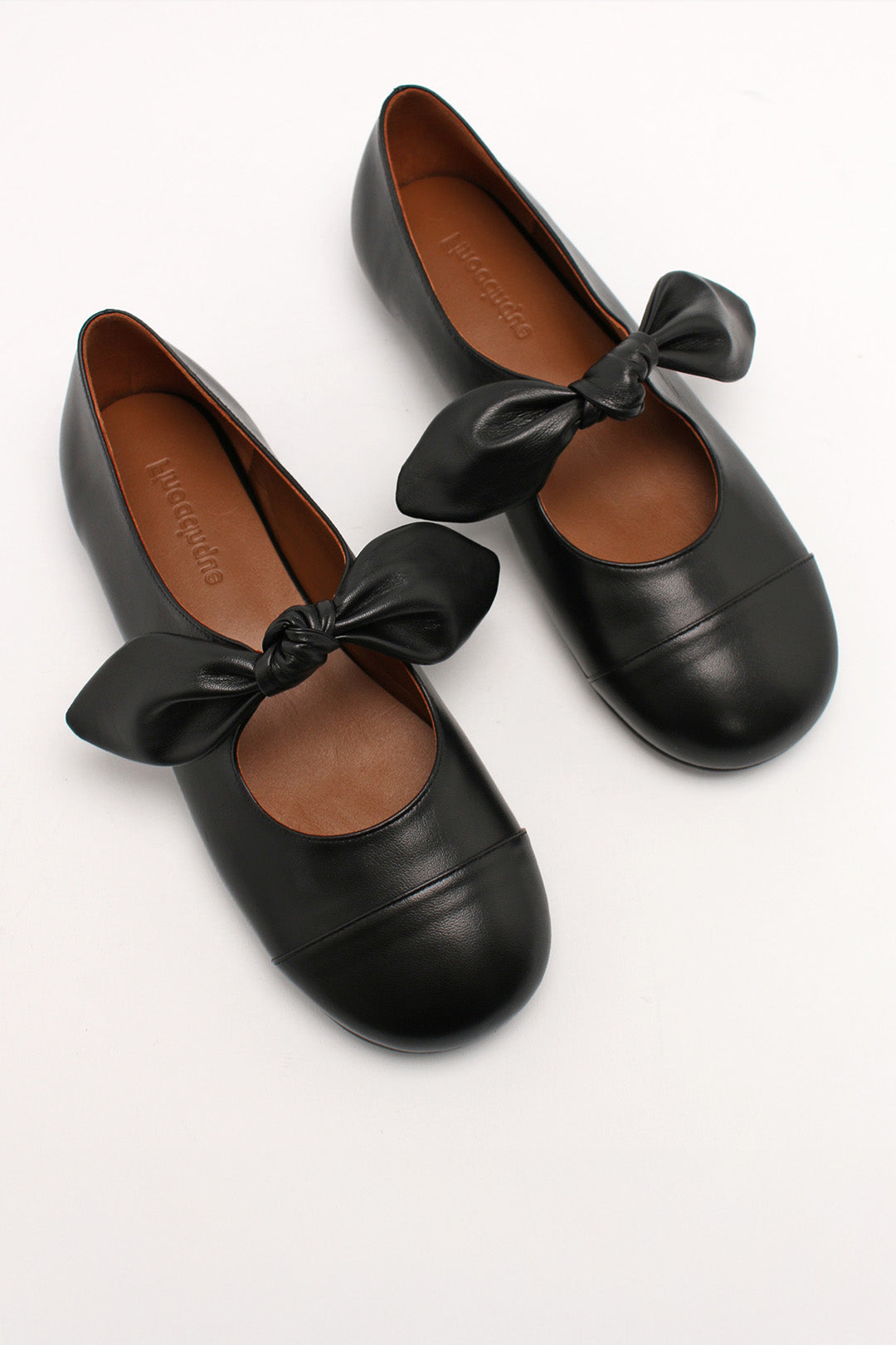 Finoacinque Lina Ribbon Maryjane black flat shoes with a ribbon detail, showcasing a stylish and comfortable design.