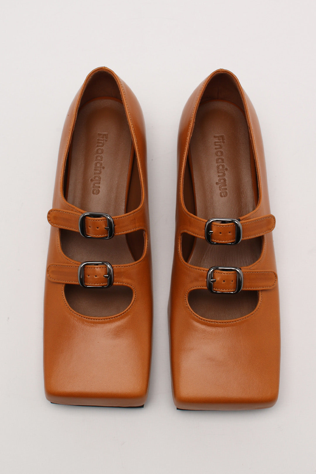 Finoacinque Nora strap flat shoes in camel with a sleek design and comfortable flat sole, shown from a side angle.