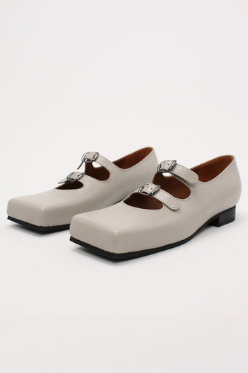 Light gray Nora strap flat shoes by Finoacinque featuring a sleek, minimalist design and comfortable flat sole.