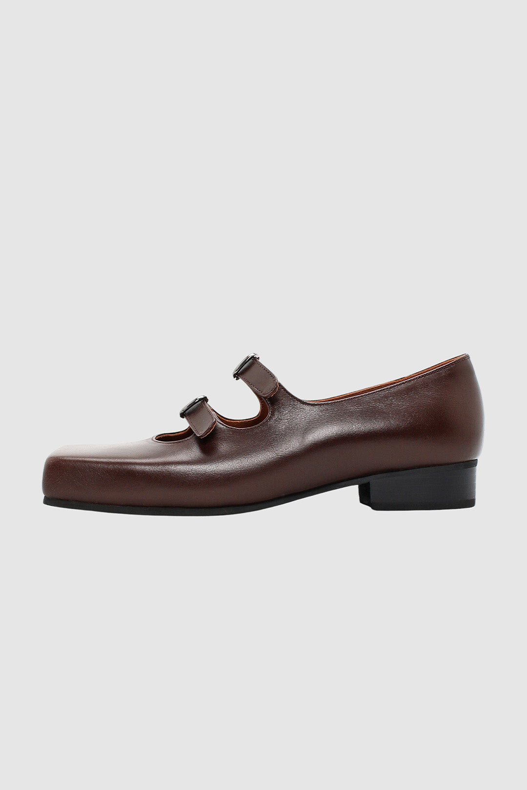 Finoacinque Nora strap flat shoes in brown with a sleek design and comfortable flat sole, perfect for casual wear.