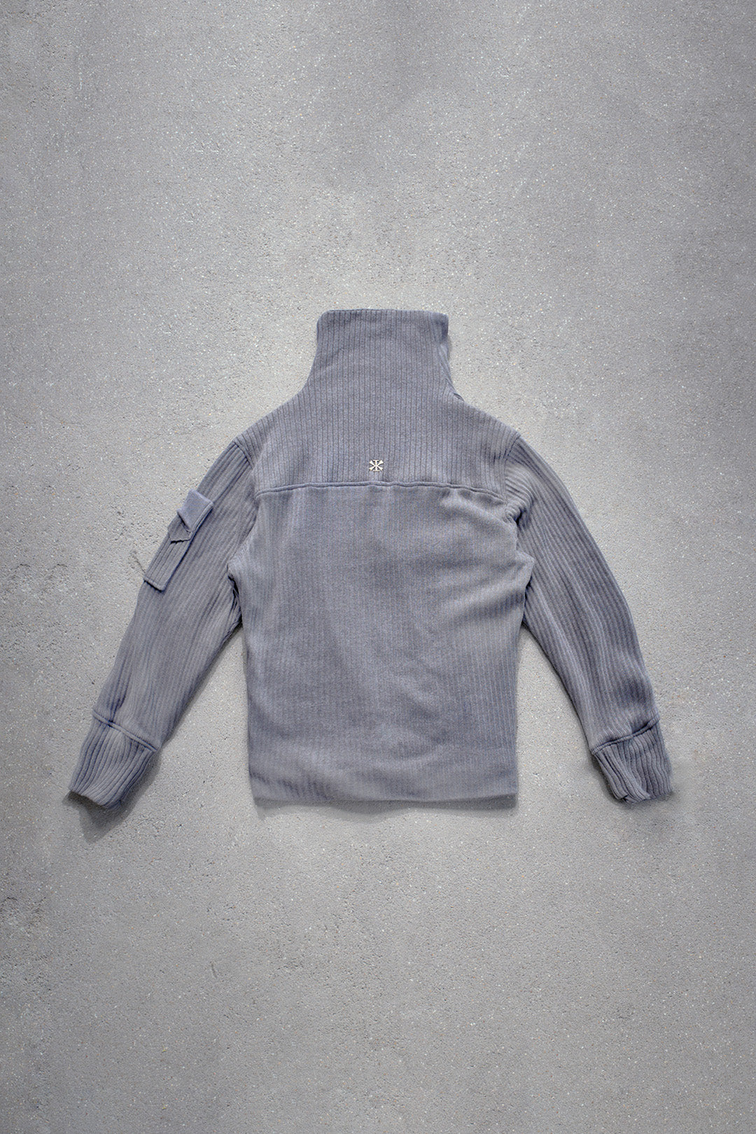 PIN TUCKED ZIP UP