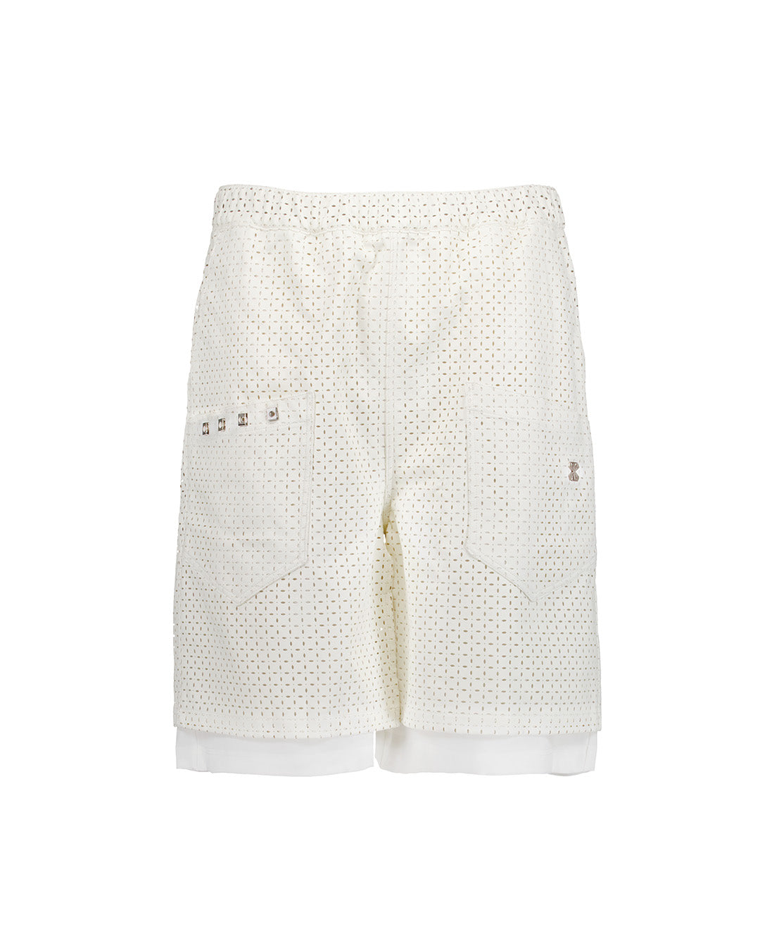 White leather layered shorts with dagger punched design from KIMMICK, featuring a stylish and edgy bottom style.