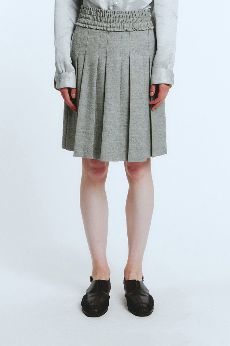 Love Crazy Wild Man grey frill pleats skirt with layered, flowing fabric and a stylish, feminine silhouette.
