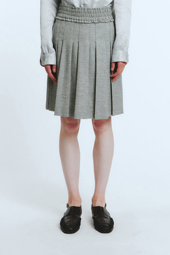 Love Crazy Wild Man grey frill pleats skirt with layered, flowing fabric and a stylish, feminine silhouette.