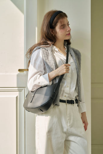 Black MIULIN Shellie Hobo Bag with slouchy design, featuring shoulder strap and minimalist style for casual or chic occasions.