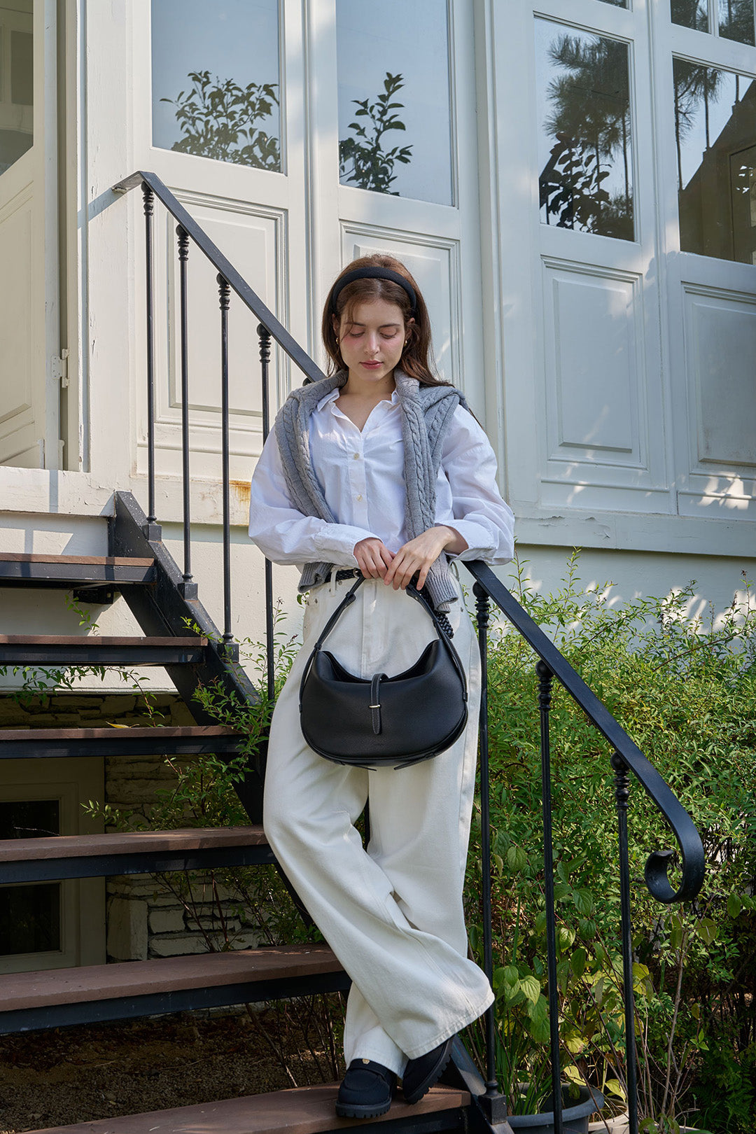 Black MIULIN Shellie Hobo Bag with adjustable strap and sleek design, featuring a spacious interior and modern style.
