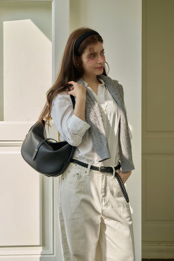 Black MIULIN Shellie Hobo Bag with sleek design and shoulder strap, showcasing stylish, versatile accessory for everyday use.