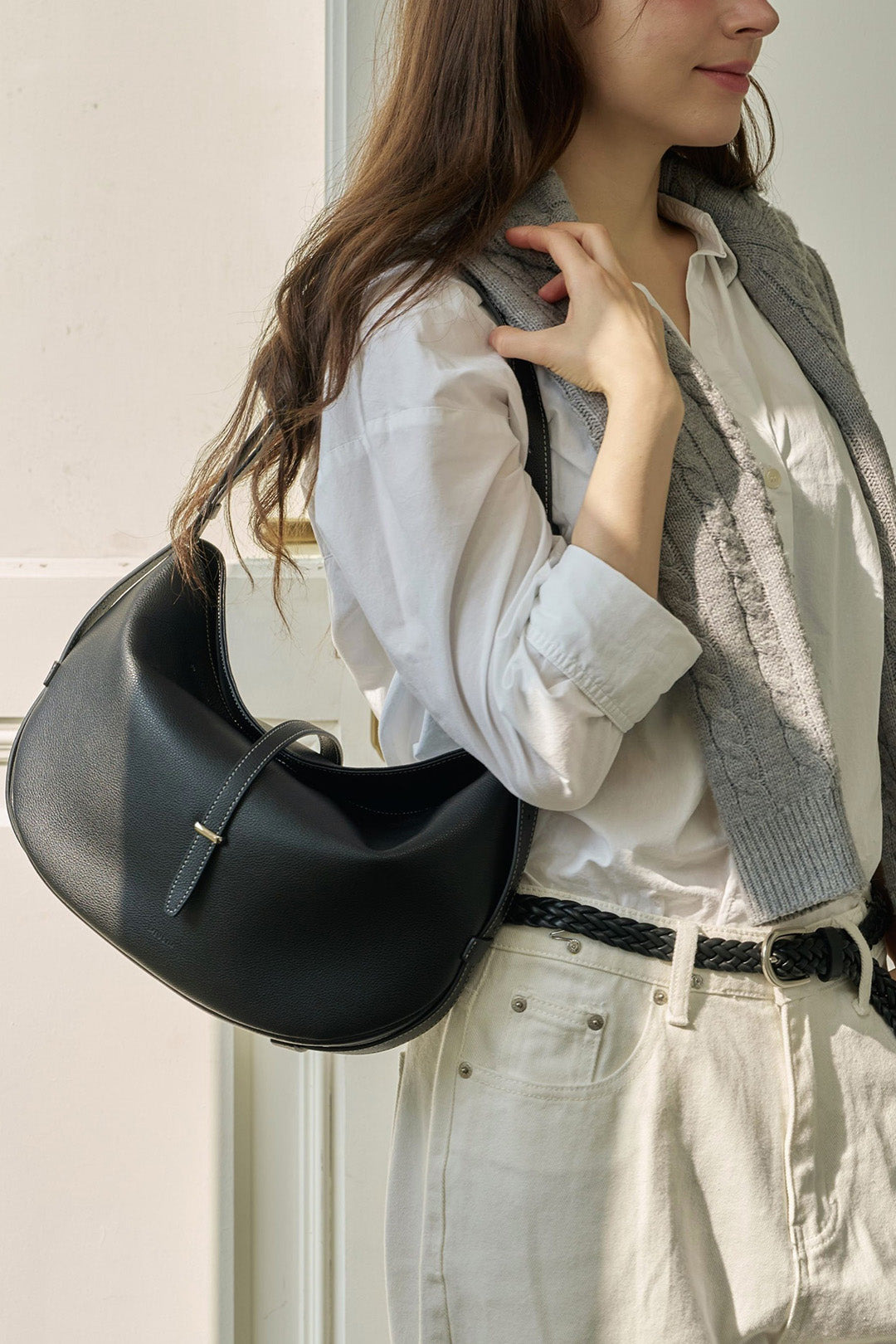 Black MIULIN Shellie Hobo Bag with shoulder strap and sleek design, shown from front view.