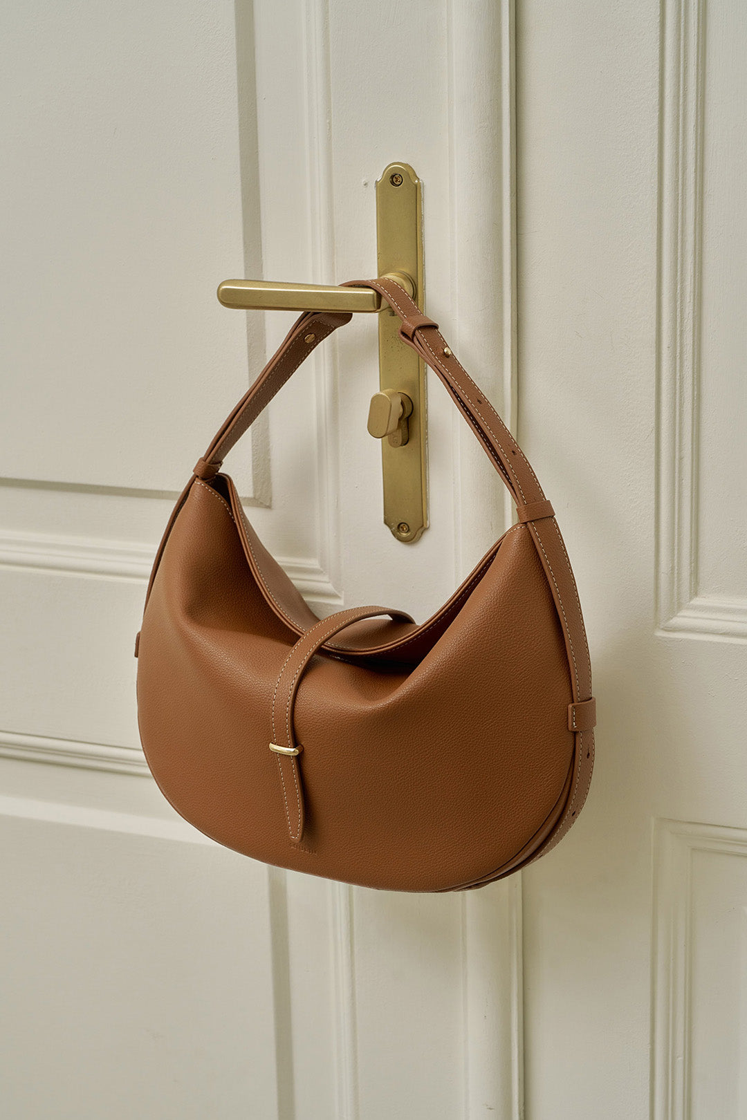 MIULIN Shellie Hobo Bag in camel leather with slouchy design and shoulder strap, showcasing stylish, casual accessory.