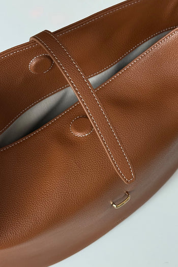 MIULIN Shellie Hobo Bag in camel leather, featuring a soft slouchy design and adjustable shoulder strap.