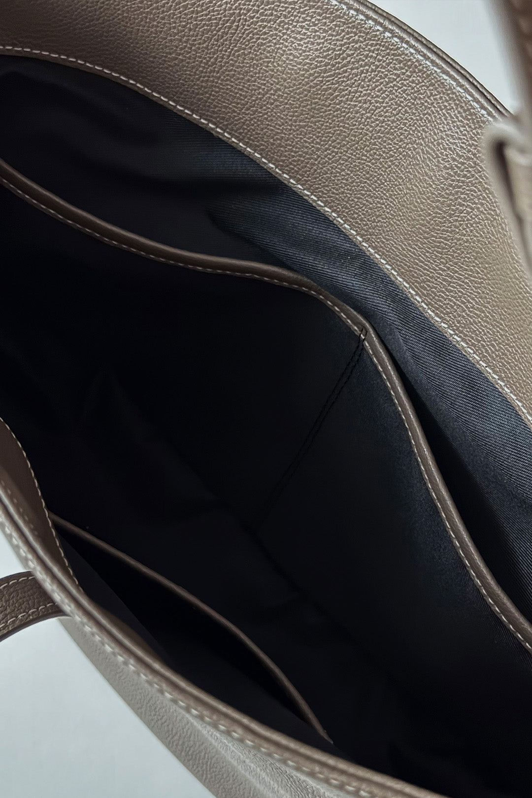 MIULIN Shellie Hobo Bag in Etoupe leather, featuring a slouchy design with shoulder strap and subtle stitching details.