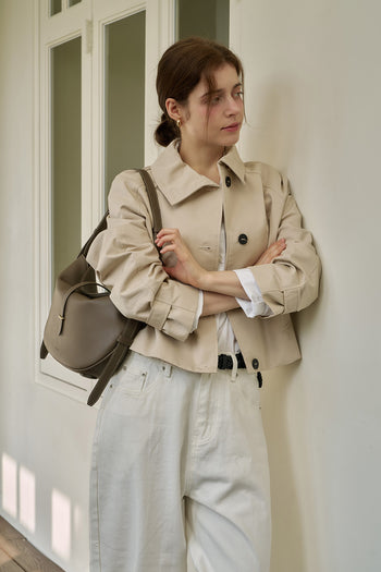 MIULIN Shellie Hobo Bag in Etoupe with rounded shape, shoulder strap, and soft leather exterior.