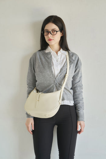 Ivory Shellie Hobo Bag by MIULIN with soft leather and casual style, featuring a slouchy silhouette and adjustable shoulder strap.